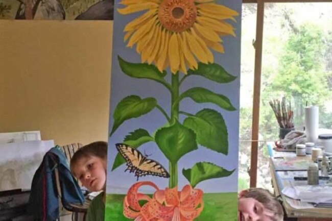 Kids posing with nearly-finished panel